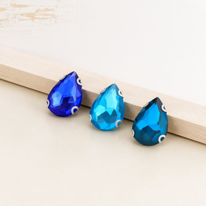 <span class=keywords><strong>Piedras</strong></span> de Cristal de Alta Calidad <span class=keywords><strong>con</strong></span> Forma de Gota, Color Personalizado, para Coser, <span class=keywords><strong>con</strong></span> Base Plana, para Decorar Sombreros, Bolsos y Ropa - Product Image 1