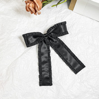 Accessoires pour femmes Pinces à cheveux avec nœud papillon et breloque en forme de cœur