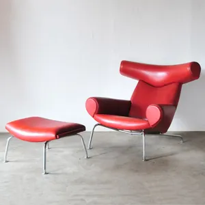 Fauteuil de créateur italien à dossier haut, fauteuil de salon moderne avec repose-pieds