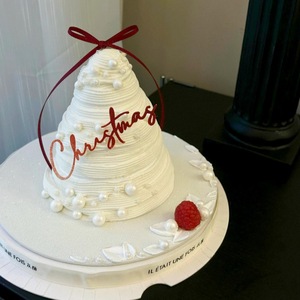 Adorno acrílico de Navidad con diseño de miel y dulzura, con lazo rojo, para exhibición en panaderías navideñas. - Product Image 1