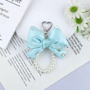 Nouvelle perle chaîne nœud papillon brillant Dia tridimensionnel rempli coloré téléphone charme niche sac porte-clés - Product Image 6