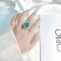Anillo de piedras preciosas de color esmeralda de circón de lujo para mujer, anillo ajustable versátil elegante hueco de platino de gama alta
