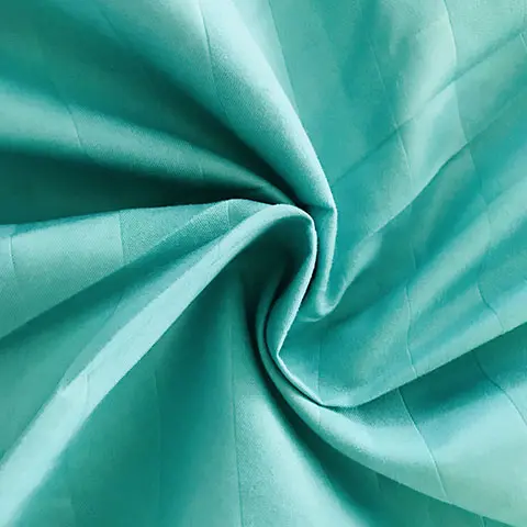 Variété de styles Tissu en microfibre de polyester gaufré teint uni pour la literie à la maison