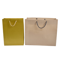 Sac de courses en papier écologique et recyclable avec impression de logo personnalisé pour l'emballage de marques de mode