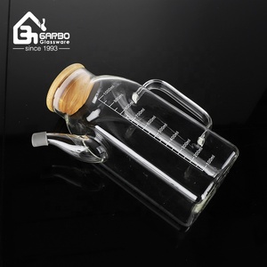 Nuevo diseño <span class=keywords><strong>de</strong></span> botella <span class=keywords><strong>de</strong></span> aceite diferente para almacenamiento <span class=keywords><strong>de</strong></span> <span class=keywords><strong>cocina</strong></span> borosilicato proveedor Chino tarros <span class=keywords><strong>de</strong></span> aceite con madera para el mercado <span class=keywords><strong>de</strong></span> Turquía - Product Image 2