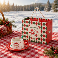 Ensemble tasse et soucoupe en céramique Anji Newell pour Noël avec design de dessin animé, conservation de la chaleur, couleur et logo personnalisés, emballage en boîte cadeau