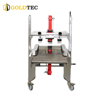 Machine d'emballage de cartons semi-automatique réglable en acier inoxydable Goldtec GTF-5050G avec entraînement latéral