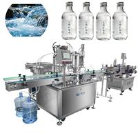 Système de remplissage linéaire entièrement automatique pour eau minérale naturelle, avec remplissage, bouchage et étiquetage intégrés, production haute vitesse