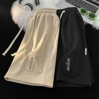 Shorts de sport de luxe pour hommes Pantalons mi-longs décontractés Pantalon cinq points pour jeune homme de grande taille pour l'été