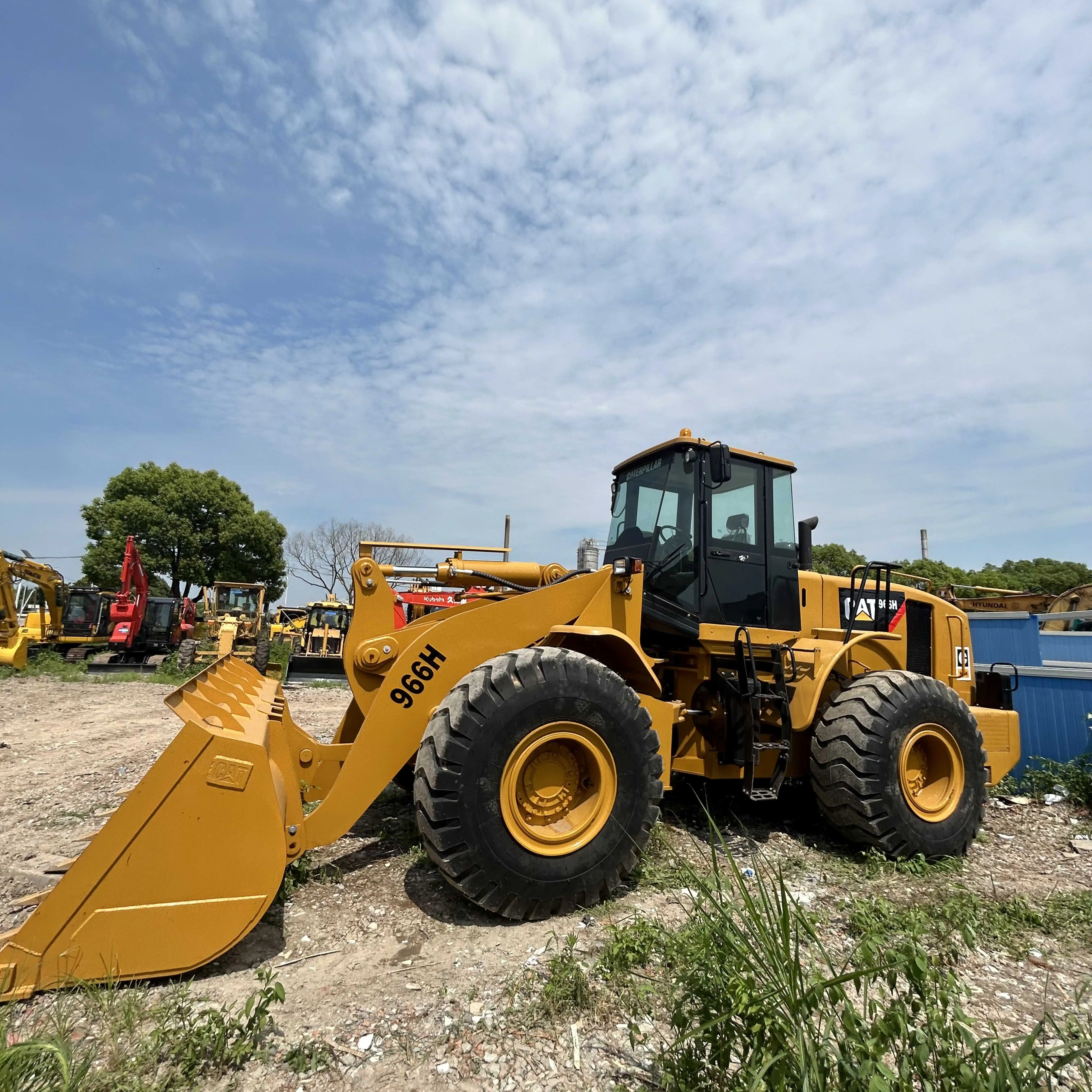 Le Japon a utilisé la chargeuse sur pneus caterpillar 966H caterpillar966H caterpillar966 966 machine de chargement à vendre