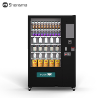 Distributeur automatique de snacks et boissons froides en acier pour la Tunisie, acceptant cartes de crédit, QR codes et jetons, idéal pour centres commerciaux et autres espaces.