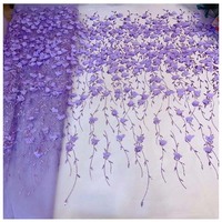 Tissu en dentelle de couleur chair dentelle brodée de fleurs 100% tissu en polyester tissu en dentelle scintillante pour robe de soirée