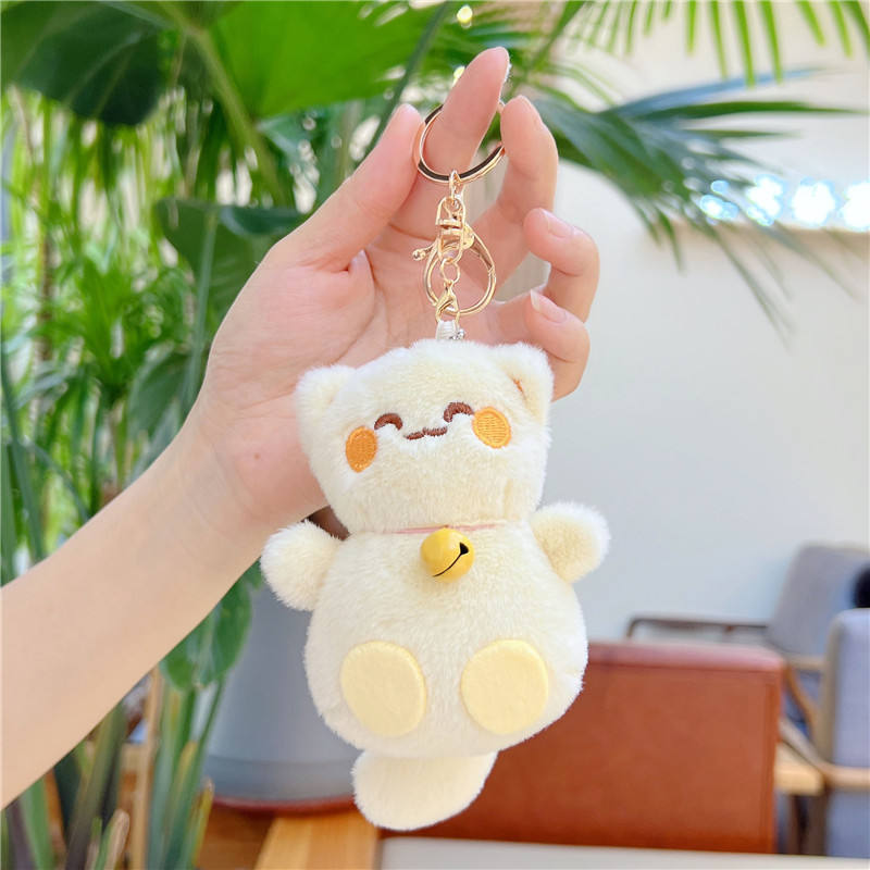 Beige bell with gold buckle