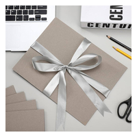 Le carton gris A4-sized polyvalent peut supporter des logos personnalisés, gris double face sans revêtement