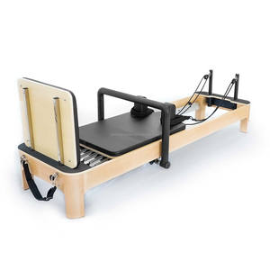Reformer de Pilates Cadillac Profesional de Madera de Haya con Trapecio Completo y Cuero de Microfibra para Rehabilitación Médica y Fisioterapia - Product Image 1