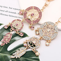 Nouveau attrape-rêves créatif en alliage, avec plume ajourée et diamant, porte-clés, pendentif pour voiture et sac, électroplaqué, petit cadeau