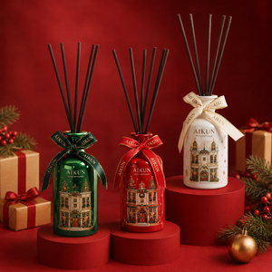 Aikun 3 Piece Mixed Color Printed Christmas House Reed Diffuser Gift Set with Black Reeds Branded Ribbon Bows for Holiday Retail - Product Image 1