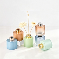 Diffuseur d'arômes en verre cylindrique de luxe 100 ml 120 ml avec bouchon à vis et impression sérigraphique pour diffuseurs d'air parfumés pour la maison
