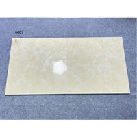 Meilleur Prix Vente Chaude Carrelage en Porcelaine Émaillée Motif Jade Jaune 60x60 cm Céramique Brillante pour Sol Intérieur Carreaux Polis