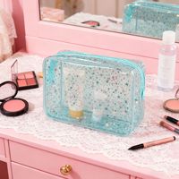 Sac de maquillage imperméable coloré à étoiles, très vendu, pour femmes, portable, petite capacité, voyage haut de gamme, trousse de toilette, sac de rangement