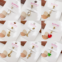 Bijoux XUPING tendance, anneaux de nombril en acier inoxydable plaqué or 14 carats, bijoux de piercing en zircone cubique