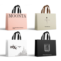 Sacs shopping en papier de luxe personnalisés avec poignées pour boutique de vêtements pour femmes, salon de beauté, emballage cadeau