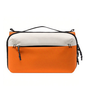 กระเป๋าเก็บของดิจิตอลอเนกประสงค์สีส้มสำหรับการเดินทางและการท่องเที่ยวพร้อมซิปปิด - Product Image 1
