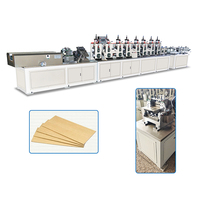 Type L et V, vitesse de 40m par minute, coupe servo, coins en carton pressé, machine avec trous de perçage