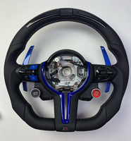 Volant de voiture de sport personnalisé en cuir perforé avec garniture bleue et palettes de changement de vitesse en carbone pour BMW Series