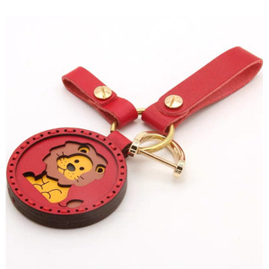 Handmade DIY <b>leather</b> <b>keychains</b>, personalized lion pattern key rings, bag charms, gift pendants, customizable. - Product Image 1