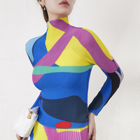Alta calidad 2025 nueva moda Miyake plisado estampado Top mujeres plisado estilo Casual elasticidad manga larga Camiseta