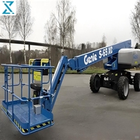 Treuil de chantier diesel Genie S-65XC d'occasion, système de mise à niveau automatique, hauteur de travail de 21,81 m, entretien facile, pompe à engrenages