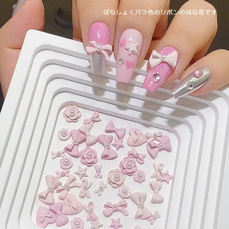 TSZS all'ingrosso rosa fiocco stella cuore Nail Art decorazione per unghie fornisce simpatici ciondoli per unghie a forma di fiore Multi-forma Kawaii