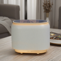 Humidificateur d'air sans eau de diffuseur d'arome électrique ultrasonique le plus vendu avec le dispositif parfumé d'aromathérapie de conception de flamme de feu