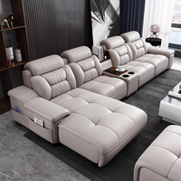 Ensemble de canapés en cuir véritable minimaliste moderne en forme de L, avec dossier capitonné rembourré en éponge, siège impérial et table d'appoint pour salon
