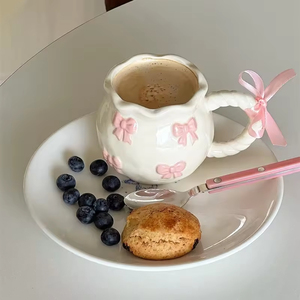 Tasse à café en céramique Huyo, vente directe usine, motif nœud 3D mignon, forme sac porte-bonheur, cadeau d'affaires de luxe léger - Product Image 4