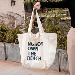 Bolsas de Compras de Lona de Algodón Blanca con Logotipo Personalizado Reciclado Promocional al por Mayor, Bolsas de Mano con Impresión de Letras para Estudiantes Universitarios - Product Image 6