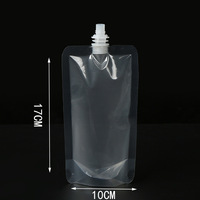 Sachets d'emballage personnalisés en PET transparent de qualité alimentaire avec bec verseur vertical extrudé pour jus et liquides, idéaux pour les boissons