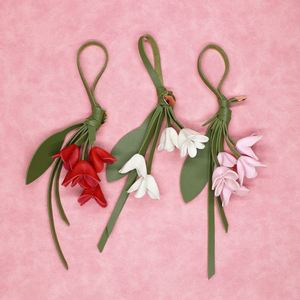 Pu <b>Leather</b> Woven Lightweight Imitation Golden Osmanthus Flower <b>Keychain</b> Charm Customizable Logo Direct Manufacturer - Product Image 1