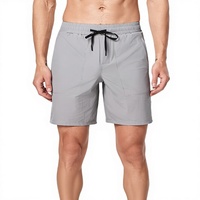 Shorts de sport pour homme, taille mi-haute, unis, avec cordon de serrage, séchage rapide, respirants, en nylon et élasthanne tricotés, avec poches, décontractés, pour l'extérieur