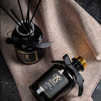 Rafraîchisseur d'air pour la décoration intérieure OEM 200ml boîte-cadeau bouteille givrée jeux de diffuseurs de bâtonnets de rotin roseau