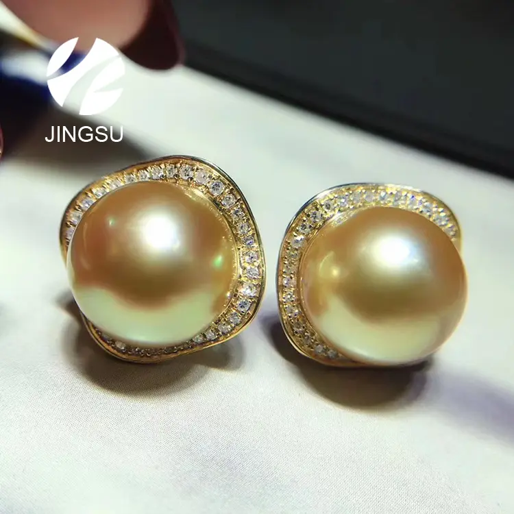 natural golden color south sea pearl luxury earrings stud design with 18K gold and diamonds for women