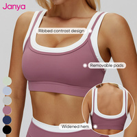 Ensemble de sport côtelé respirant et à séchage rapide de haute qualité pour femme, avec brassière de sport color block, crop top et leggings pour le yoga