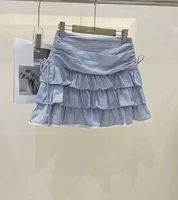 Ensemble de mode estivale : Blouse rayée sans manches à volants et jupe à volants