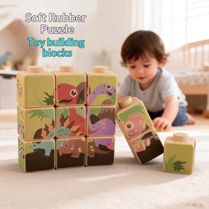 Cubi Magici per l'Educazione Precoce dei Bambini, Blocchi di Costruzione Quadrati in Gomma Morbida con Espressioni di Dinosauri e Animali, Puzzle Impilabile Musicale per Neonati - Product Image 1