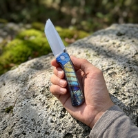Couteau tactique utilitaire OEM personnalisé 14C28N avec manche en titane, verrouillage Frame Lock, finition bleu thermique, outil de chasse extérieur, vente directe usine en gros