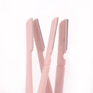เครื่องโกนหนวดสำหรับผู้หญิงสีชมพูใบมีดสำหรับคิ้วแบบพกพาขนาดเล็ก