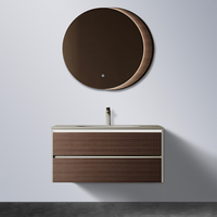 Meuble-lavabo mural gris anthracite à cannelures horizontales sans poignée avec vasque intégrée, miroir rond et éclairage LED