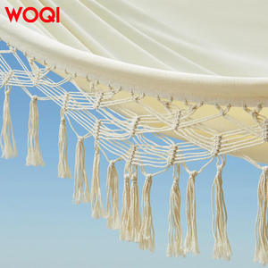 Hamac en coton bohème WOQI, capacité 200 kg, portable, avec pompons, utilisation intérieure et extérieure - Product Image 4