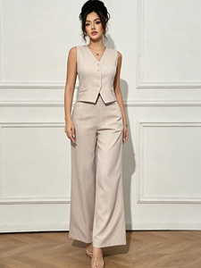 Ensemble 2 pièces d'été 2026 pour <span class=keywords><strong>femme</strong></span> : <span class=keywords><strong>Gilet</strong></span> <span class=keywords><strong>sans</strong></span> manches à col en V boutonné et pantalon taille haute à jambes larges – Tenue décontractée chic pour le bureau – Vente en gros - Product Image 1